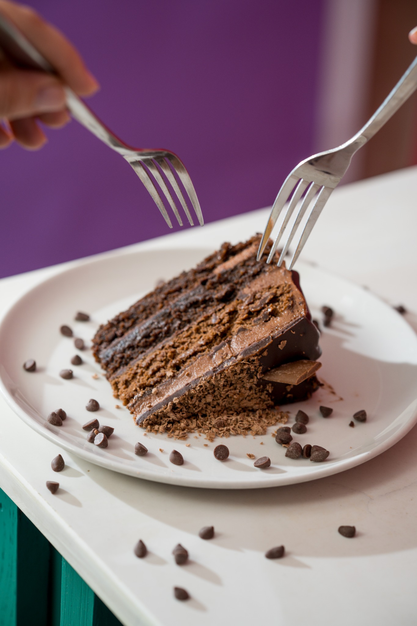 A slice of chocolate cake on a plate
