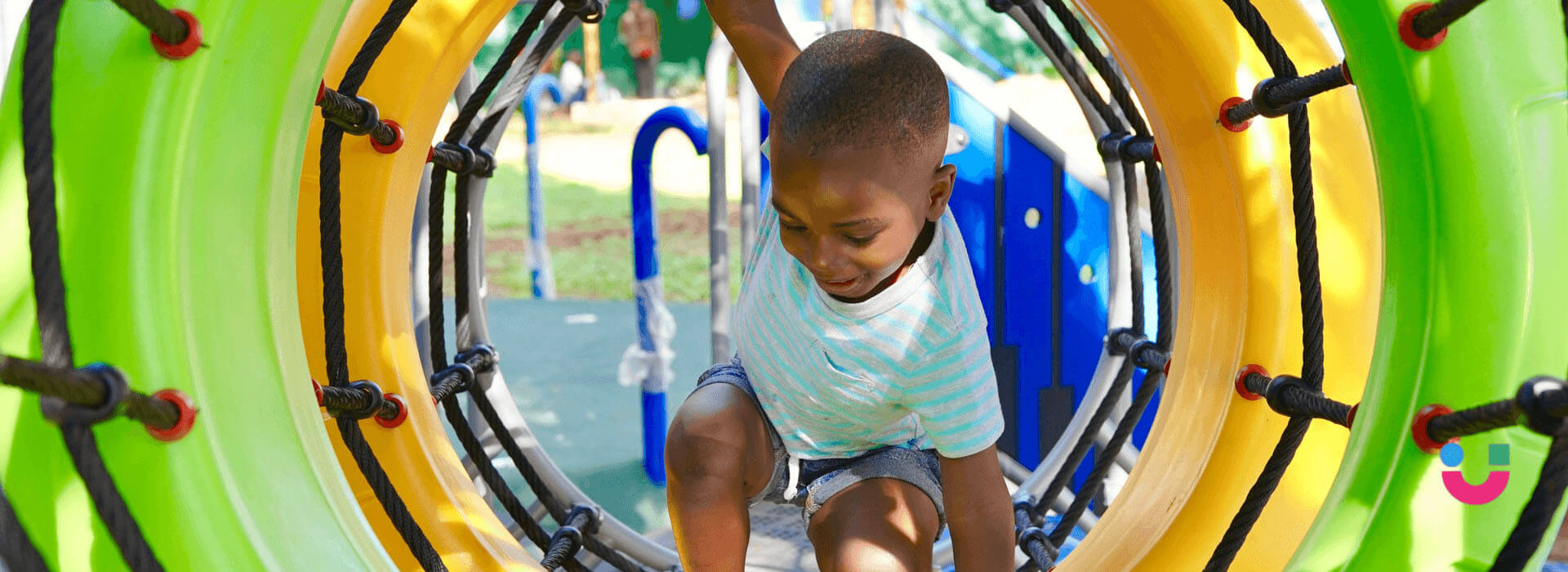 A child exploring the colourful JoyJozi play area in Dunkeld, Johannesburg